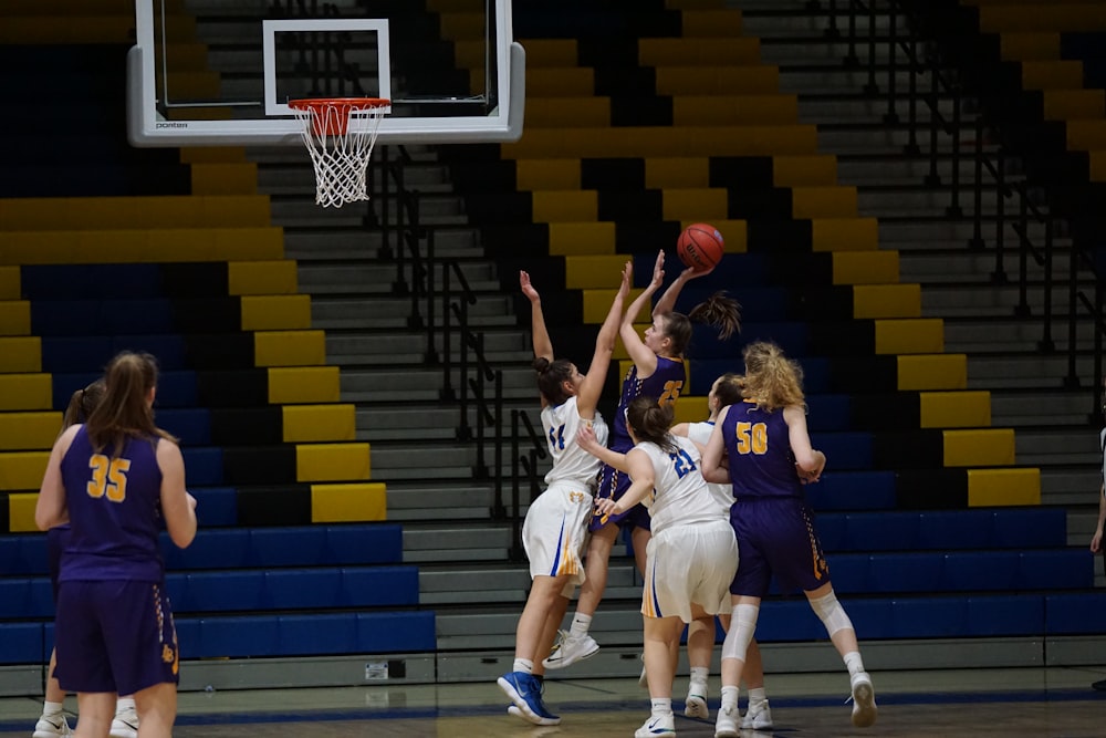 female playing basketball