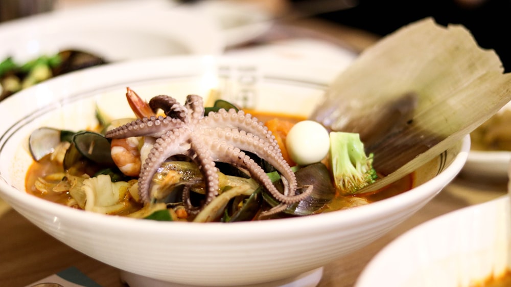 cooked food in white ceramic bowl