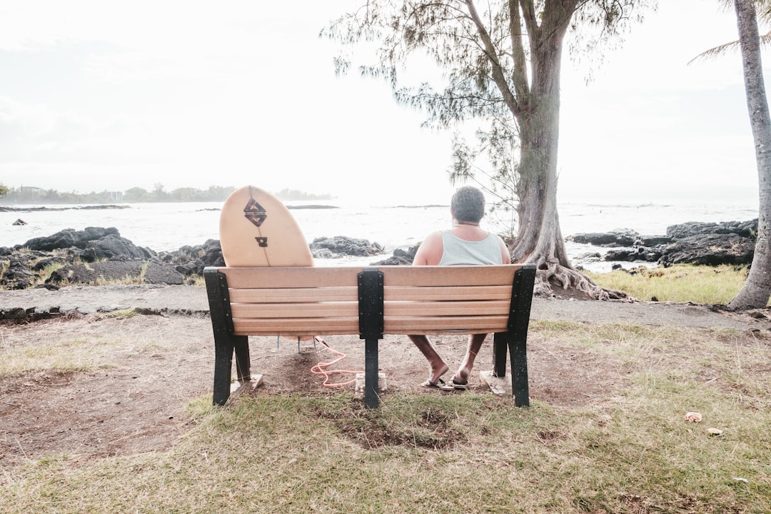 man sitting on bench