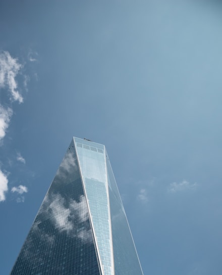 low-angle photography of curtain wall building during daytime