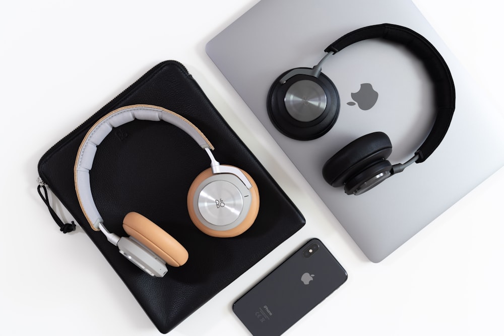 two black and grey headphones