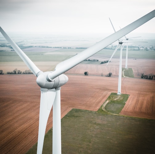 three white windmill during daytime