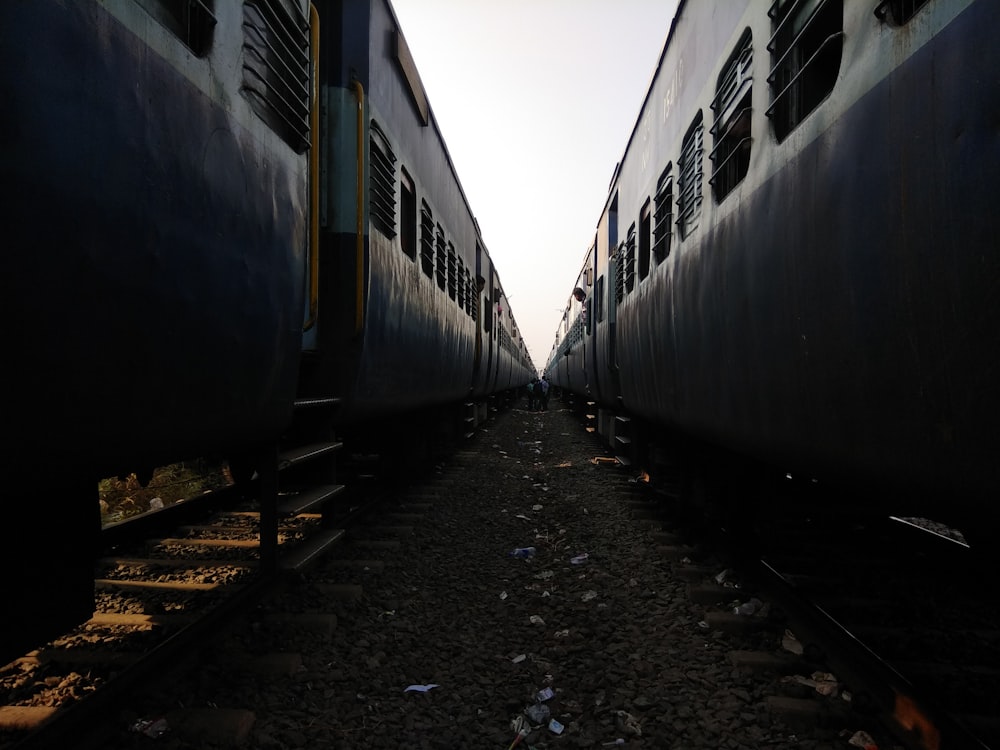close-up photography of two trains