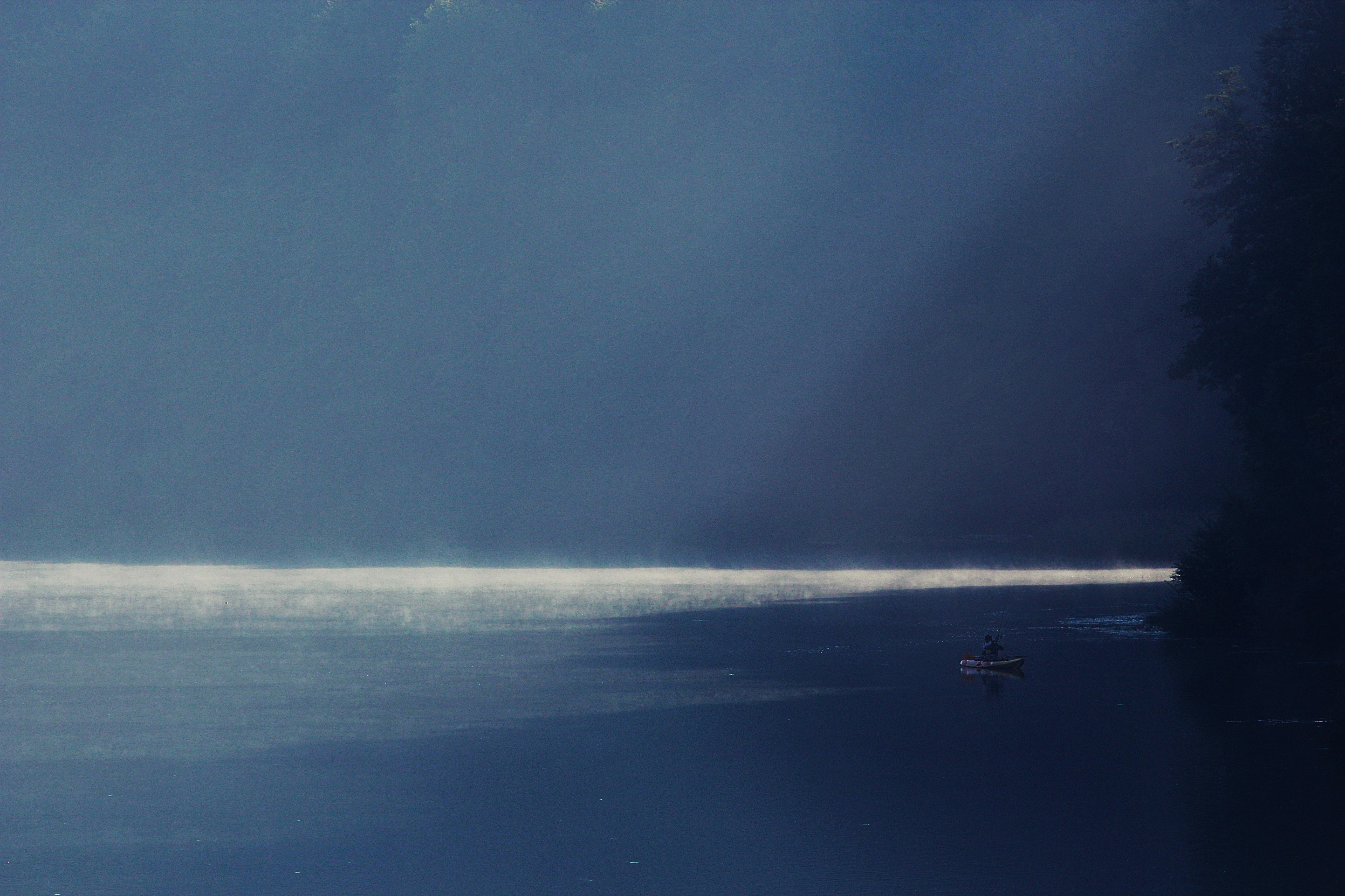 boat in body of water during daytime