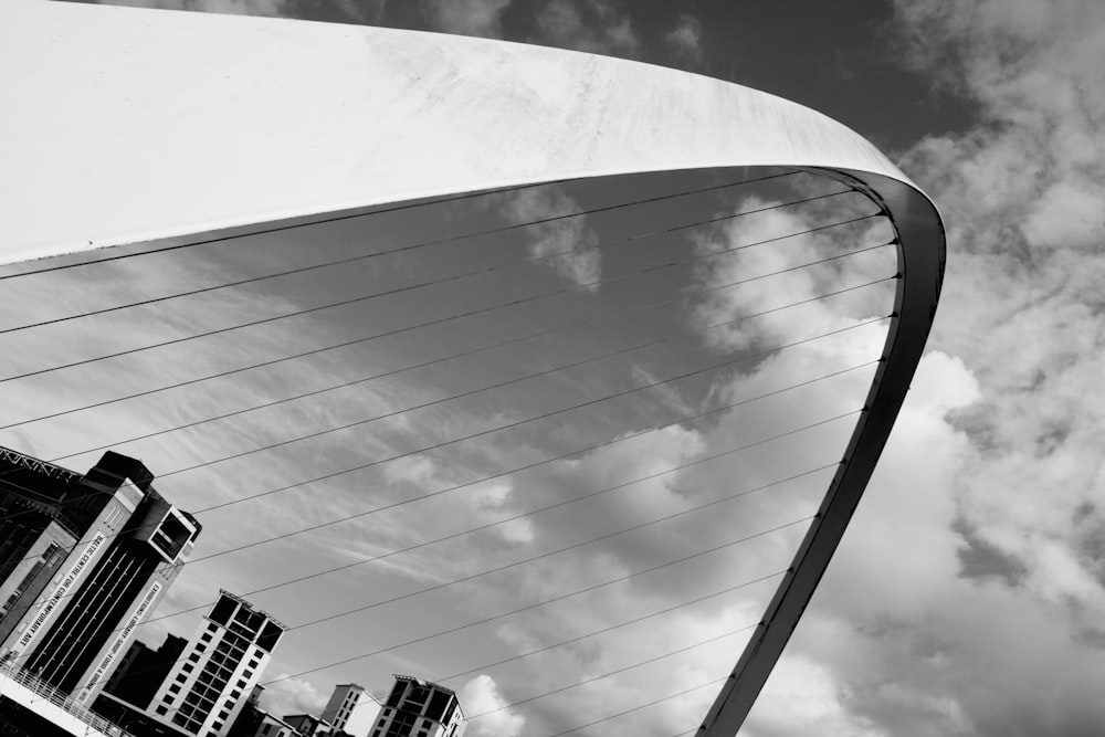 grayscale photography of concrete arch