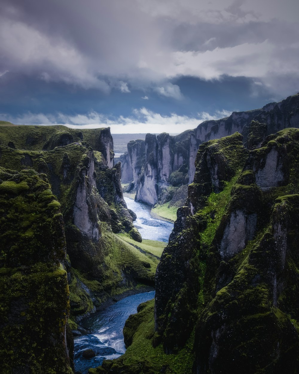 aerial photography of river between mountains during daytime