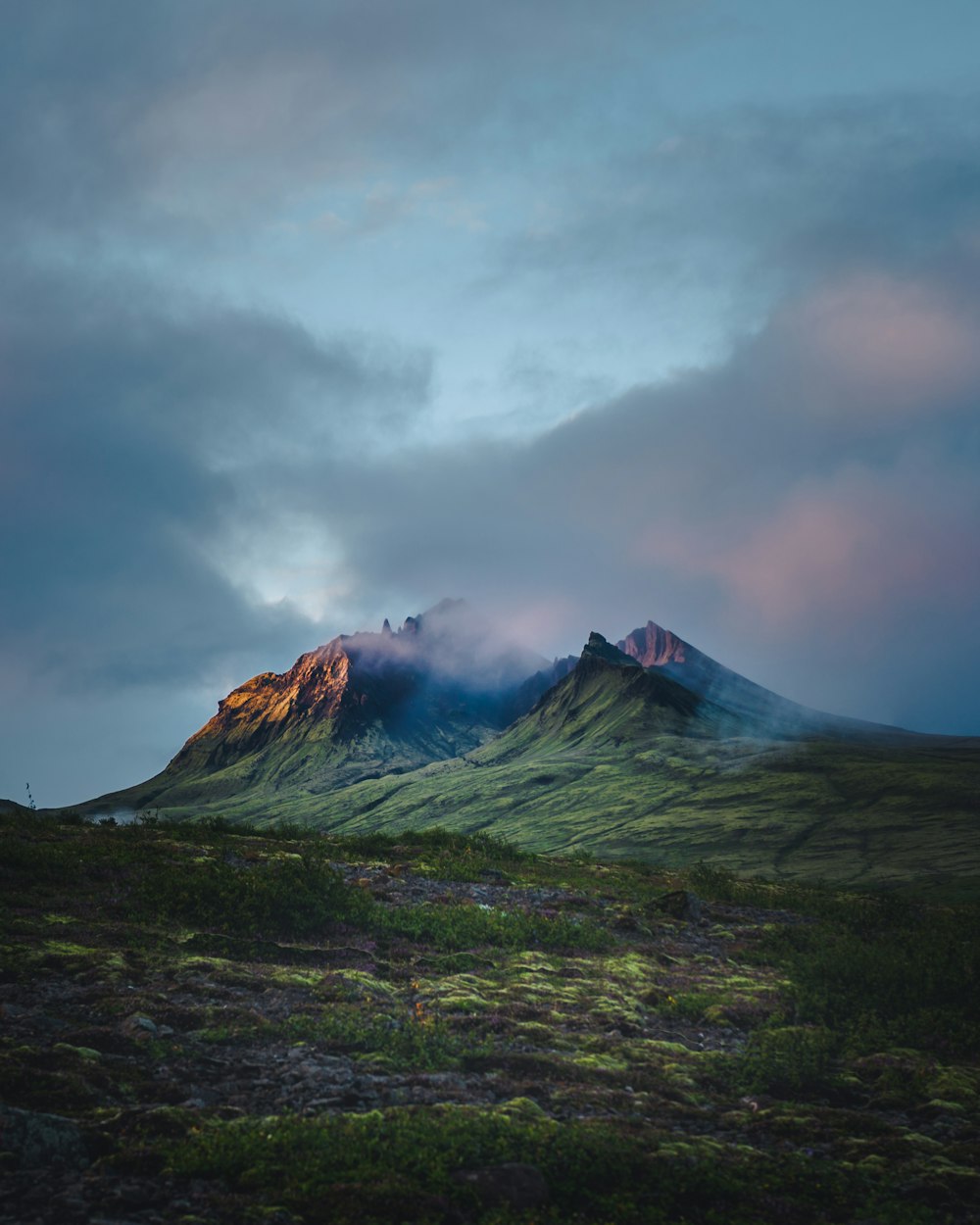 horned mountain under cloudy sky during daytime