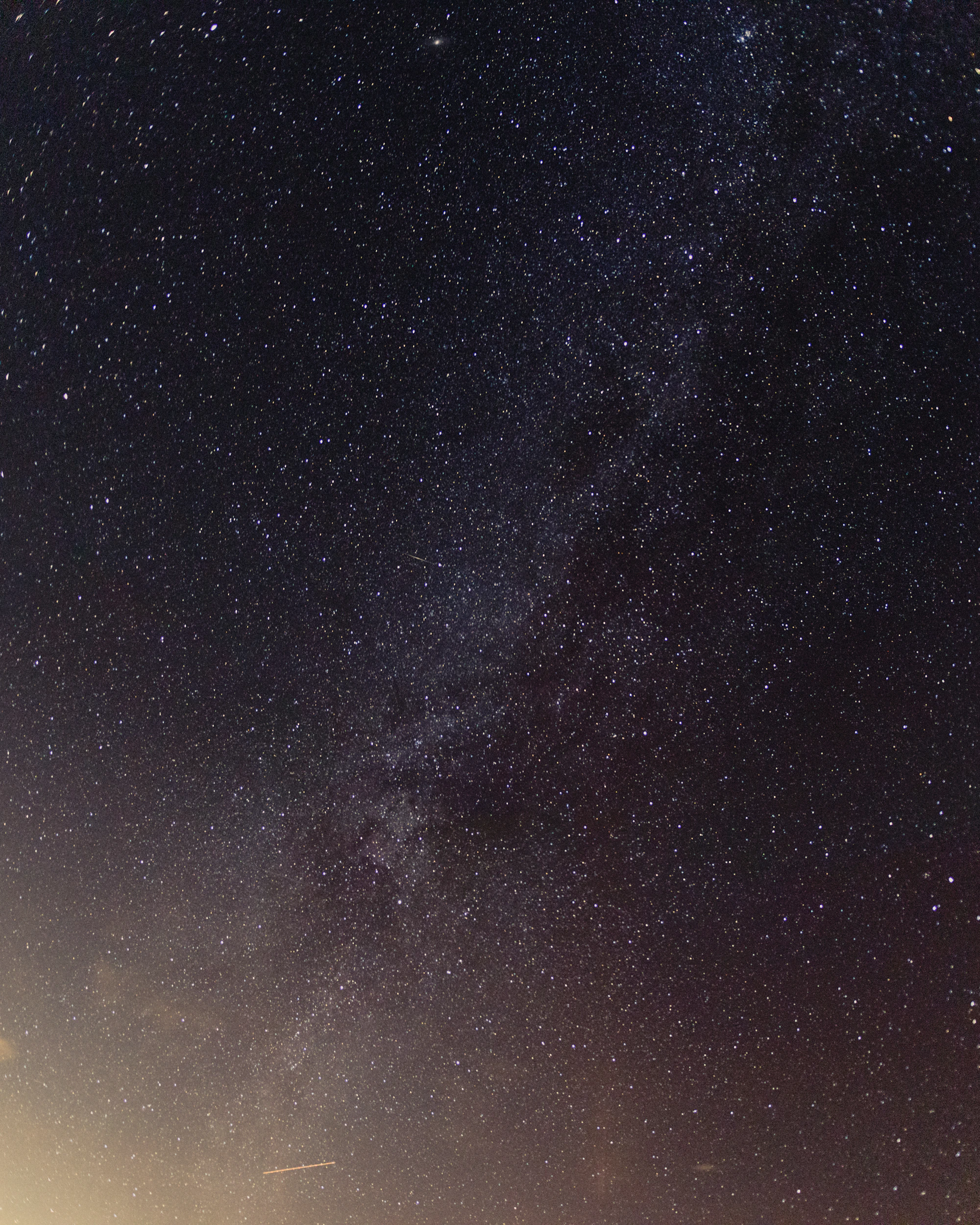 Starry night sky over the mountains