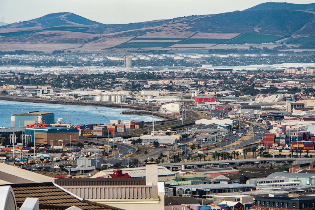 aerial view of buildings near body of water