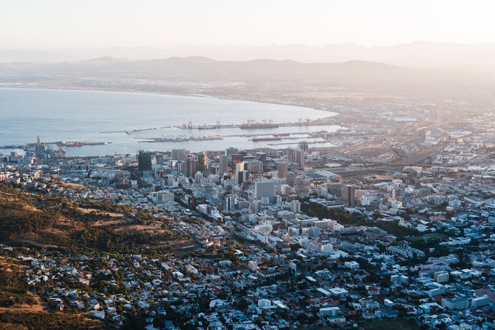 aerial view of city near sea during day