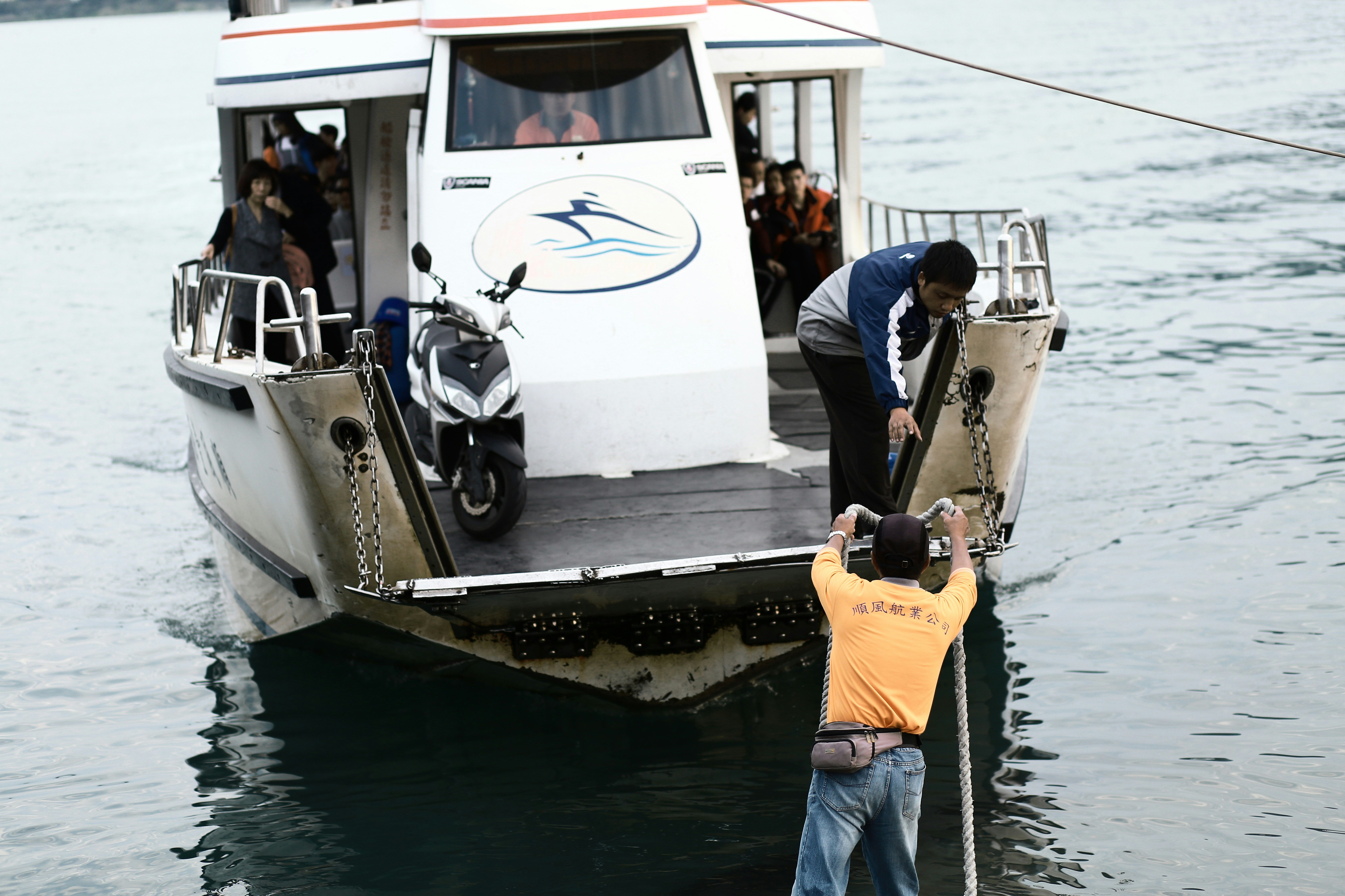 damaged boat being inspected after a collision - boating accident lawsuit