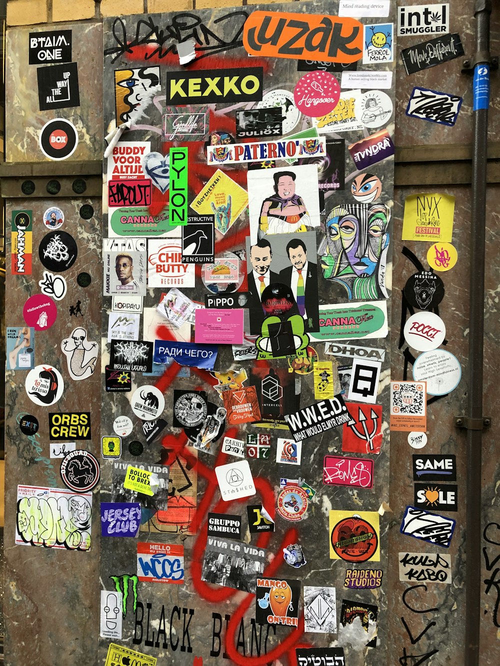 assorted sticker on refrigerator