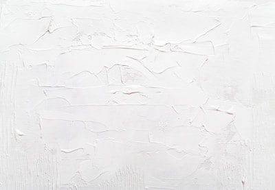 a white wall with some white paint on it