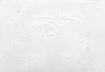a white wall with some white paint on it