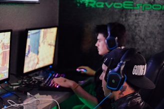 two men playing PC games