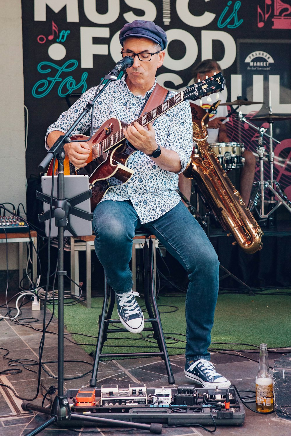 man playing electric guitar