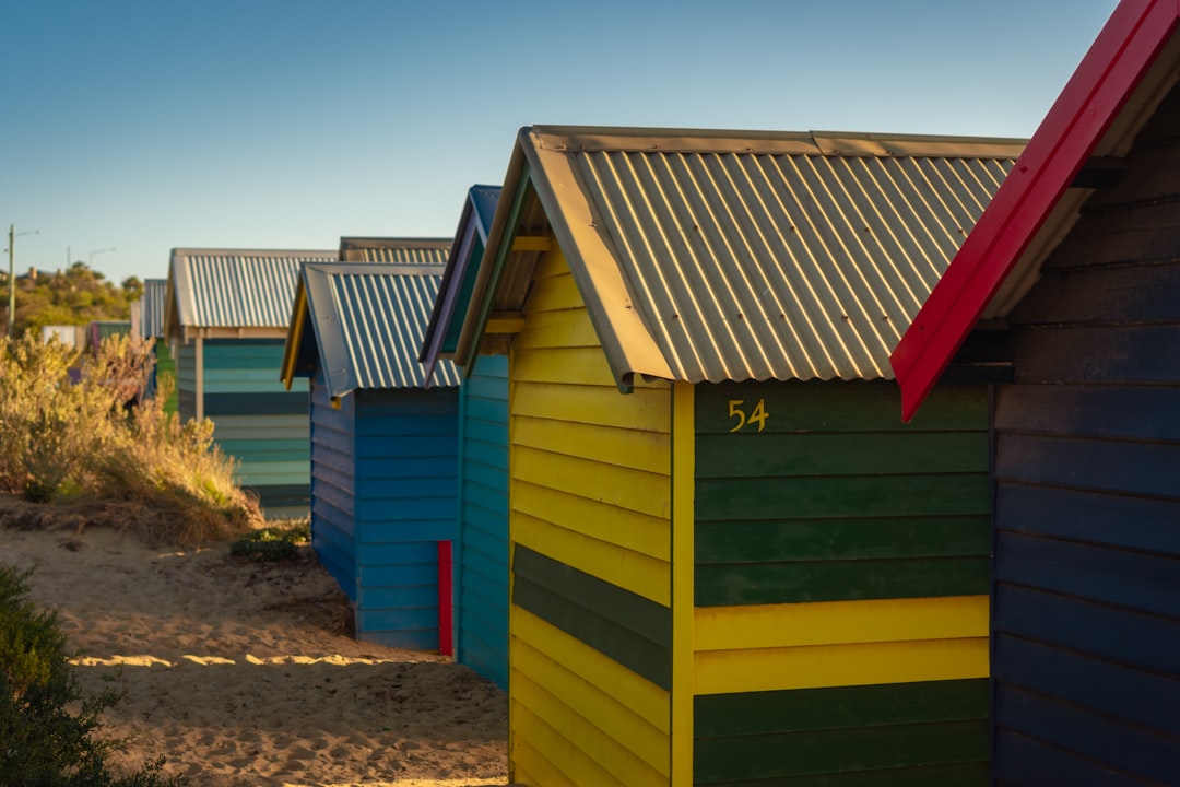 yellow and green wooden house