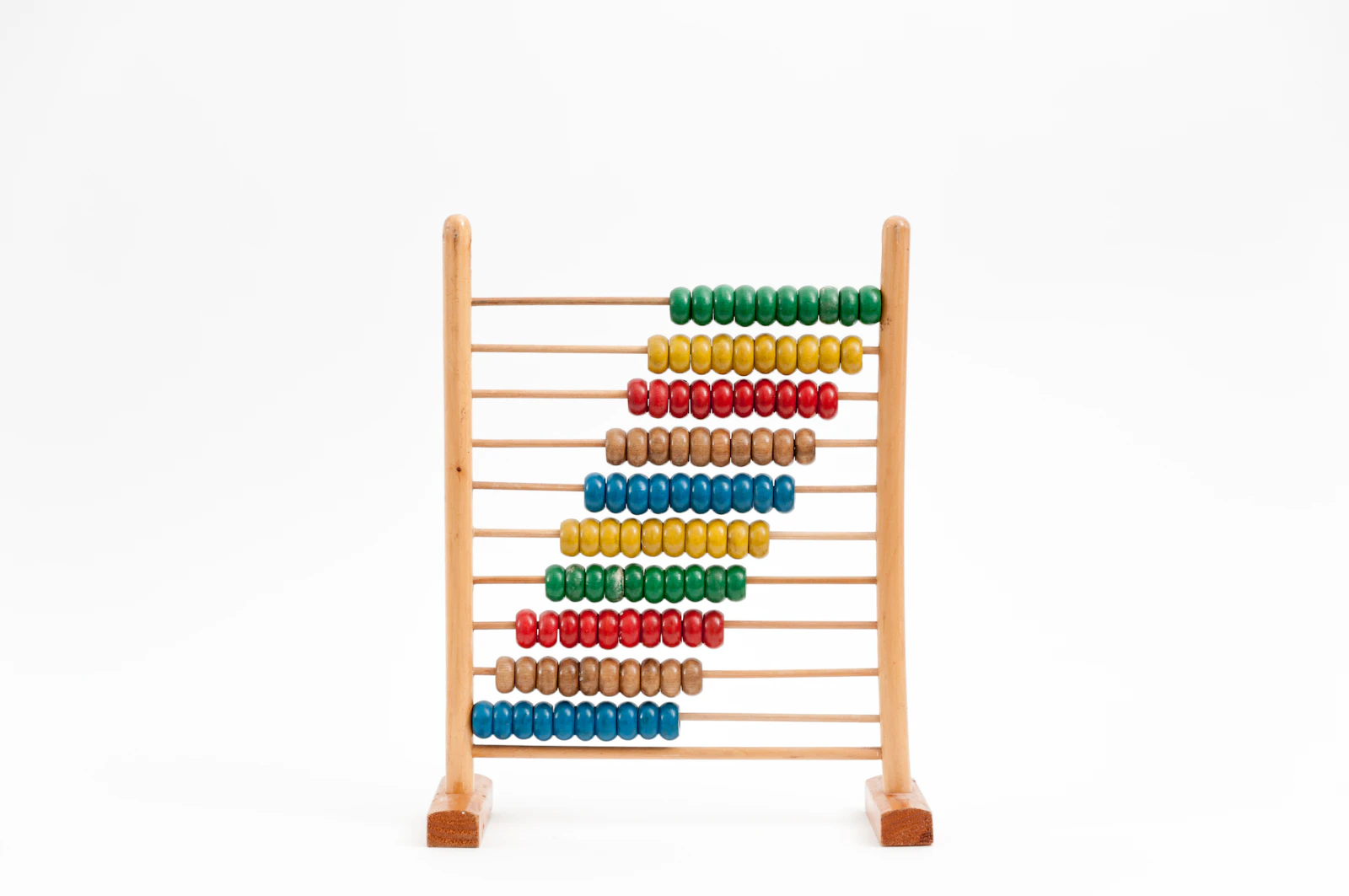 A wooden abacus with colored beads on a white ground