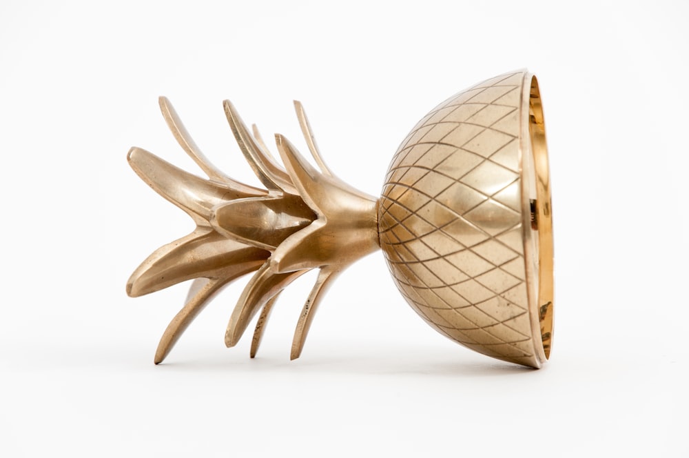 gold-colored pineapple cup