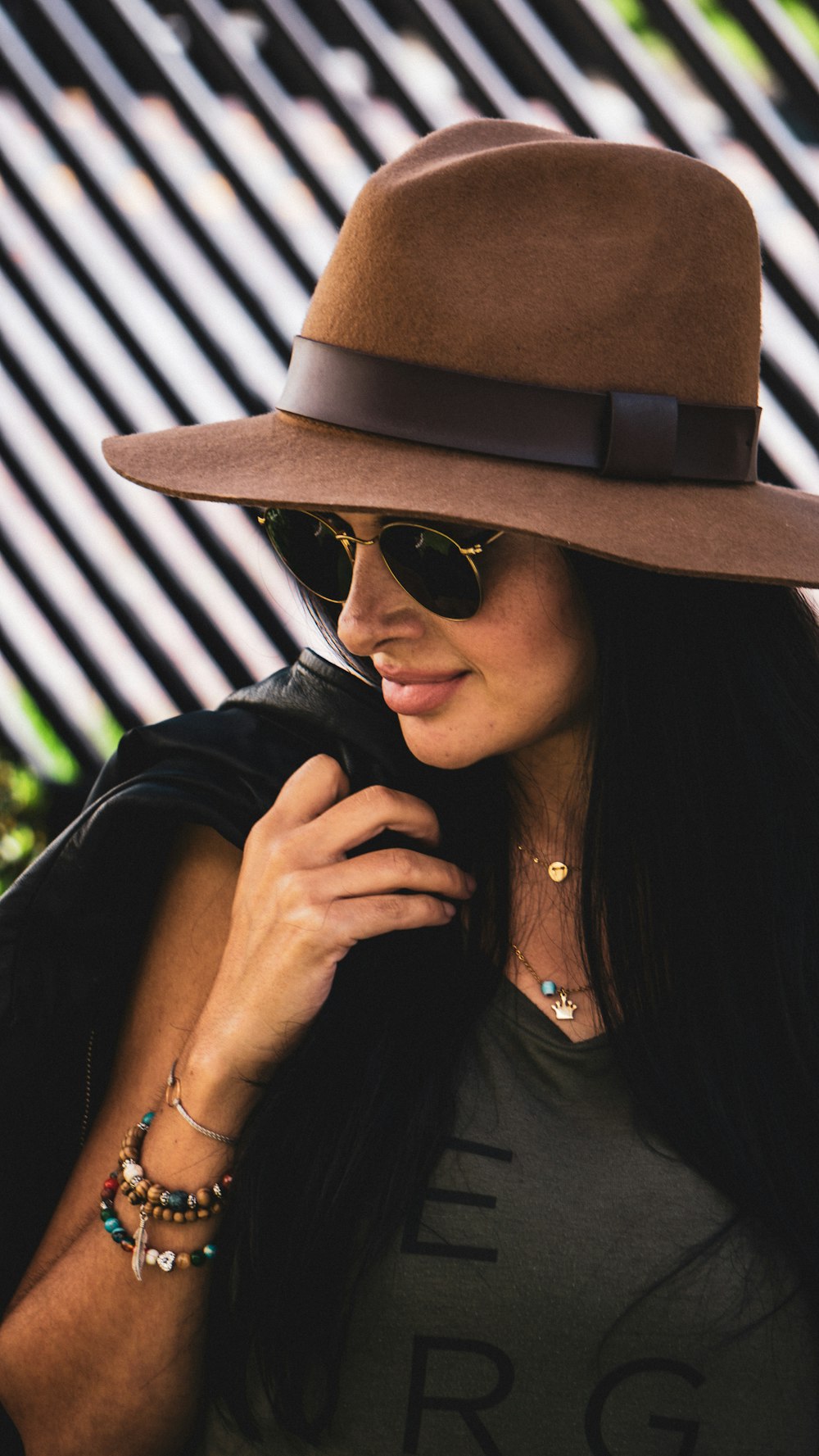 woman wearing brown hat