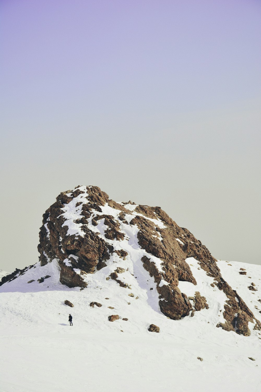 snow covered cliff