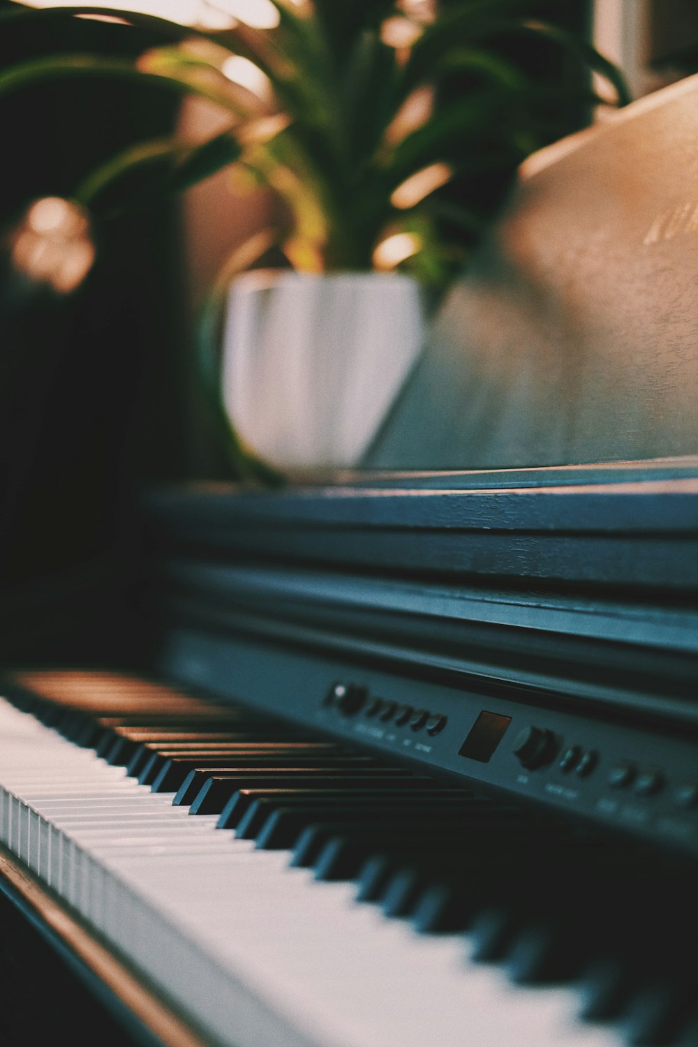 closeup photography of upright piano