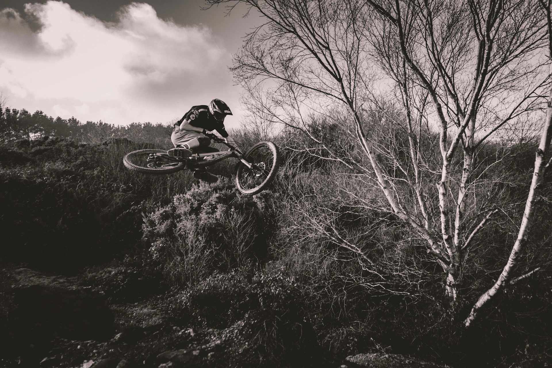 woman wearing yellow long-sleeved dress under white clouds and blue sky during daytime
