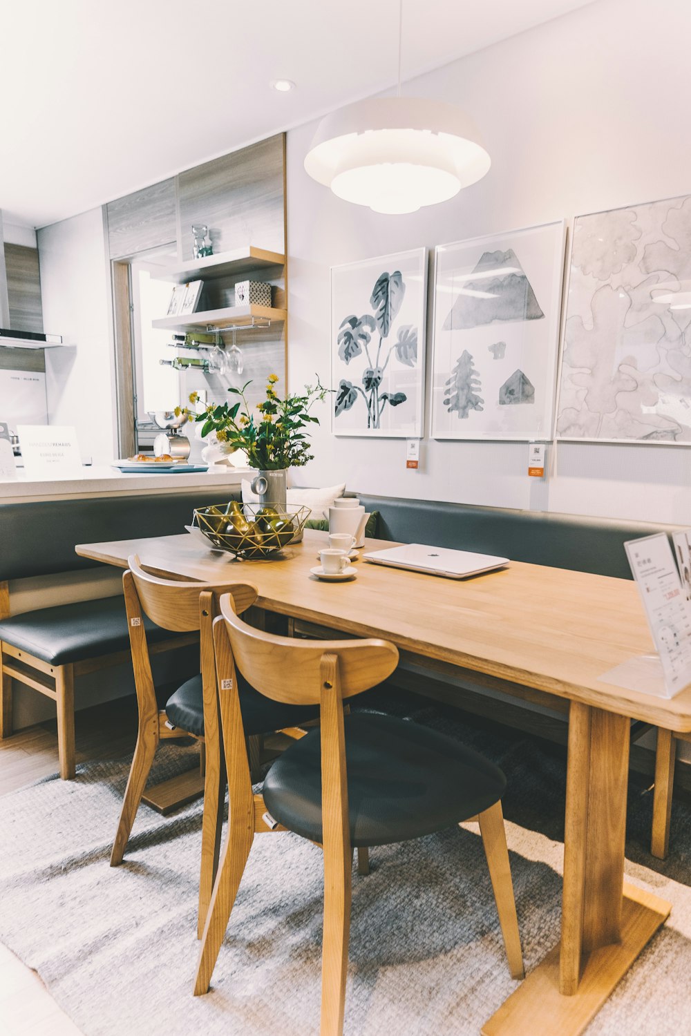 two brown wooden chairs in front of brown desk