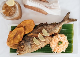 fried fish with sliced lemon