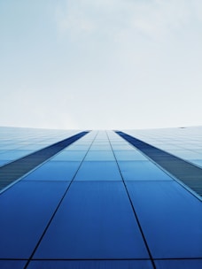 worms eye view photography of black building