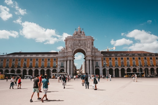 people gathered on street in Lisbon Portugal