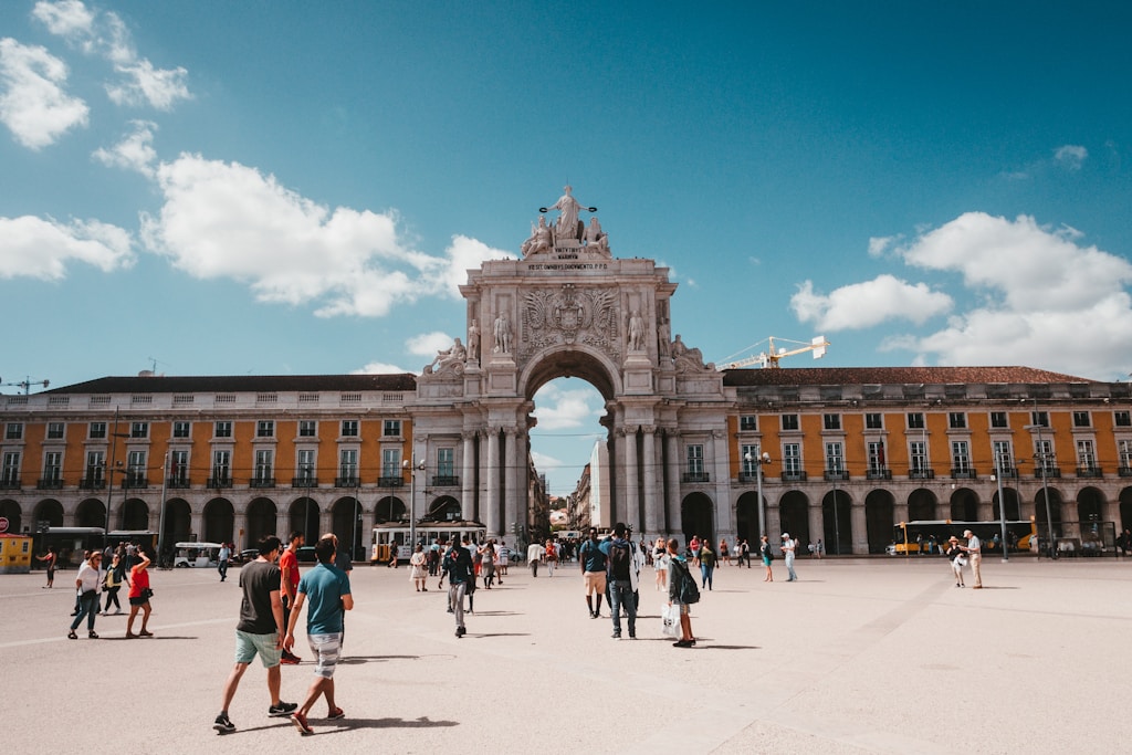 The majestic Rua Augusta Arch in Lisbon’s historic downtown, a symbol of the city’s rich cultural heritage.