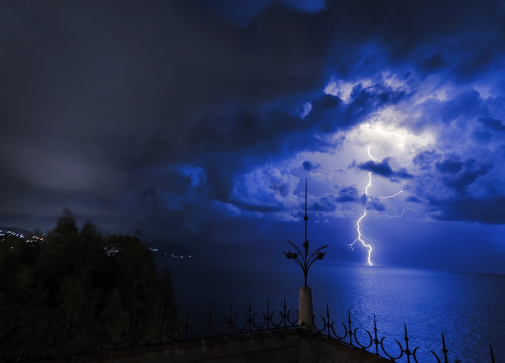 lightning hit on the sea during night