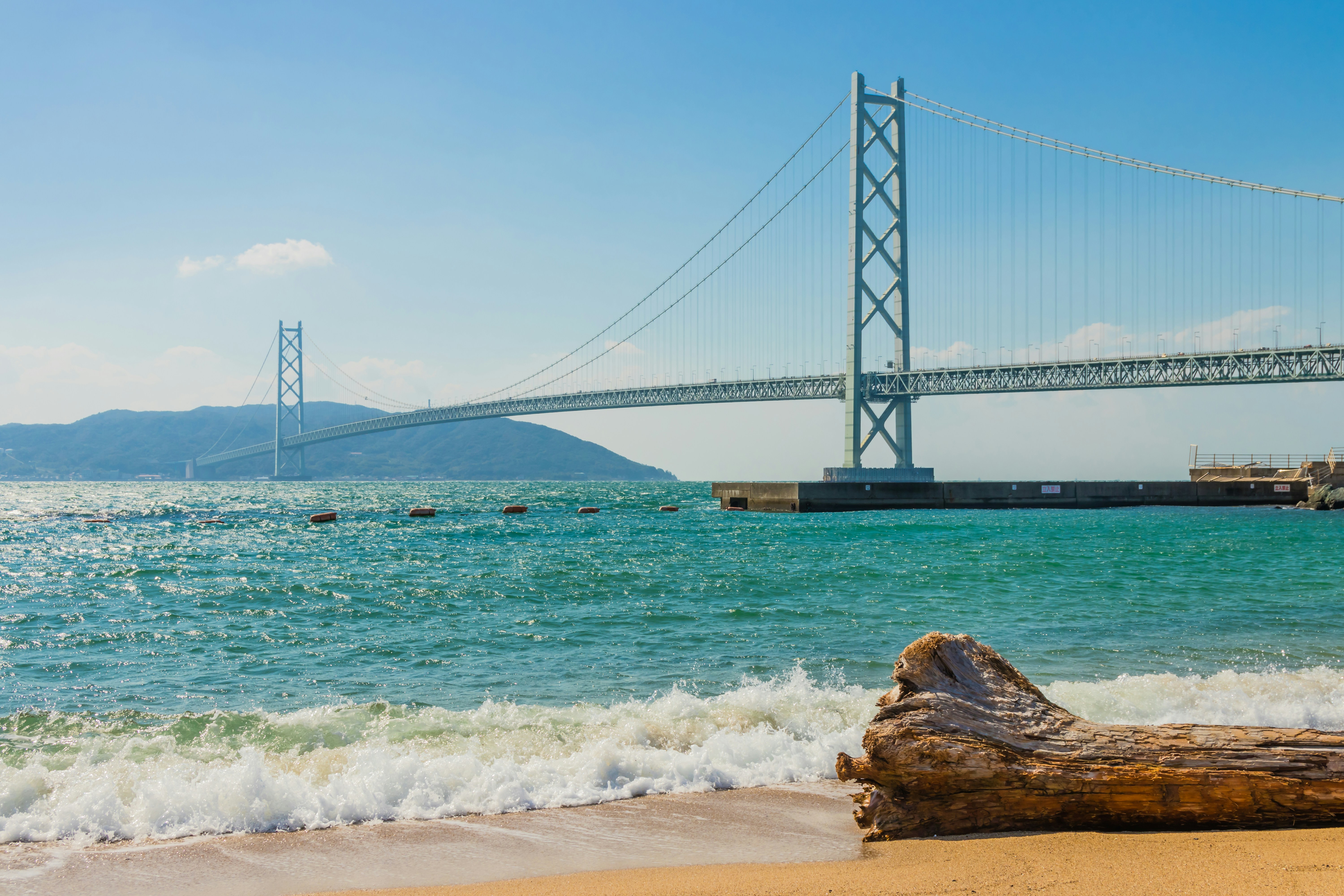 suspension bridge under blue sky