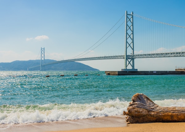 suspension bridge under blue sky