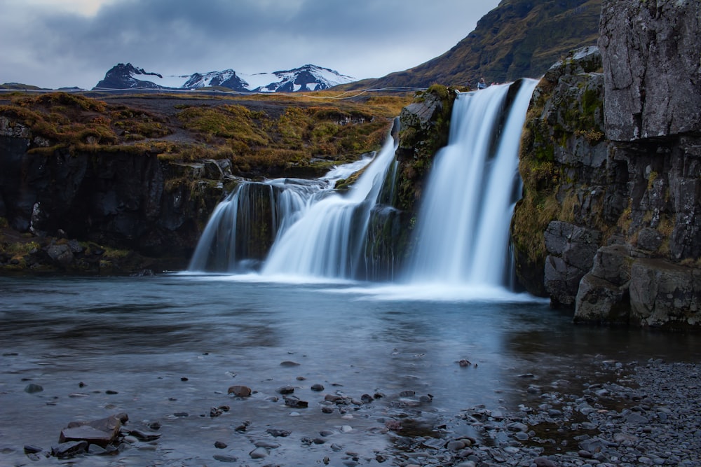 time lapse photography of waterfalls