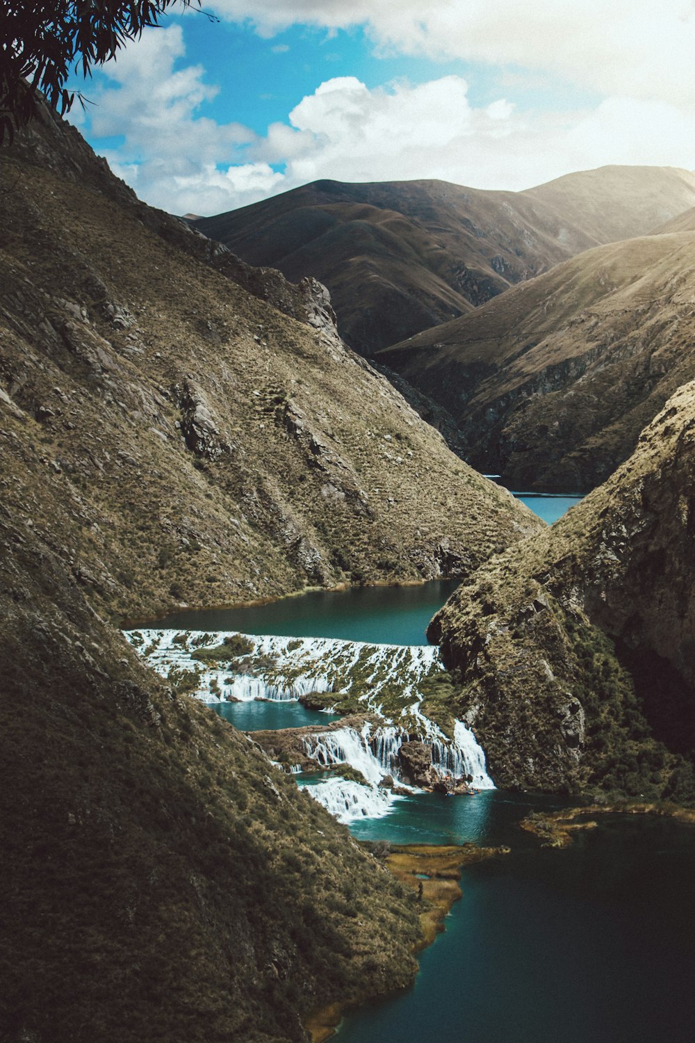 water stream between mountain