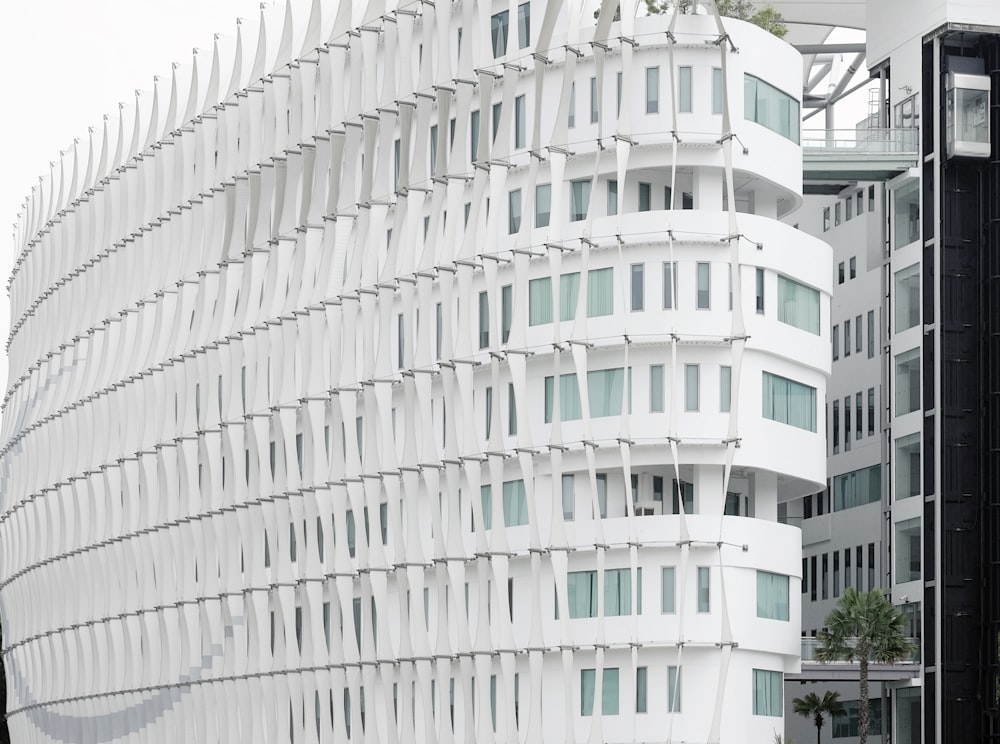 white concrete high-rise building during daytime