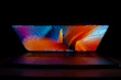 Sleek SSD drive with a futuristic design glowing softly against a dark background.