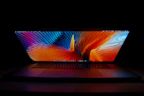 Sleek SSD drive with a futuristic design glowing softly against a dark background.