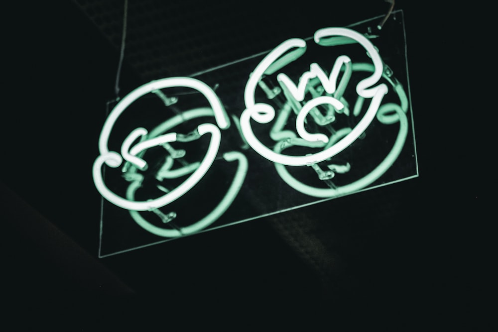 two green LED signs