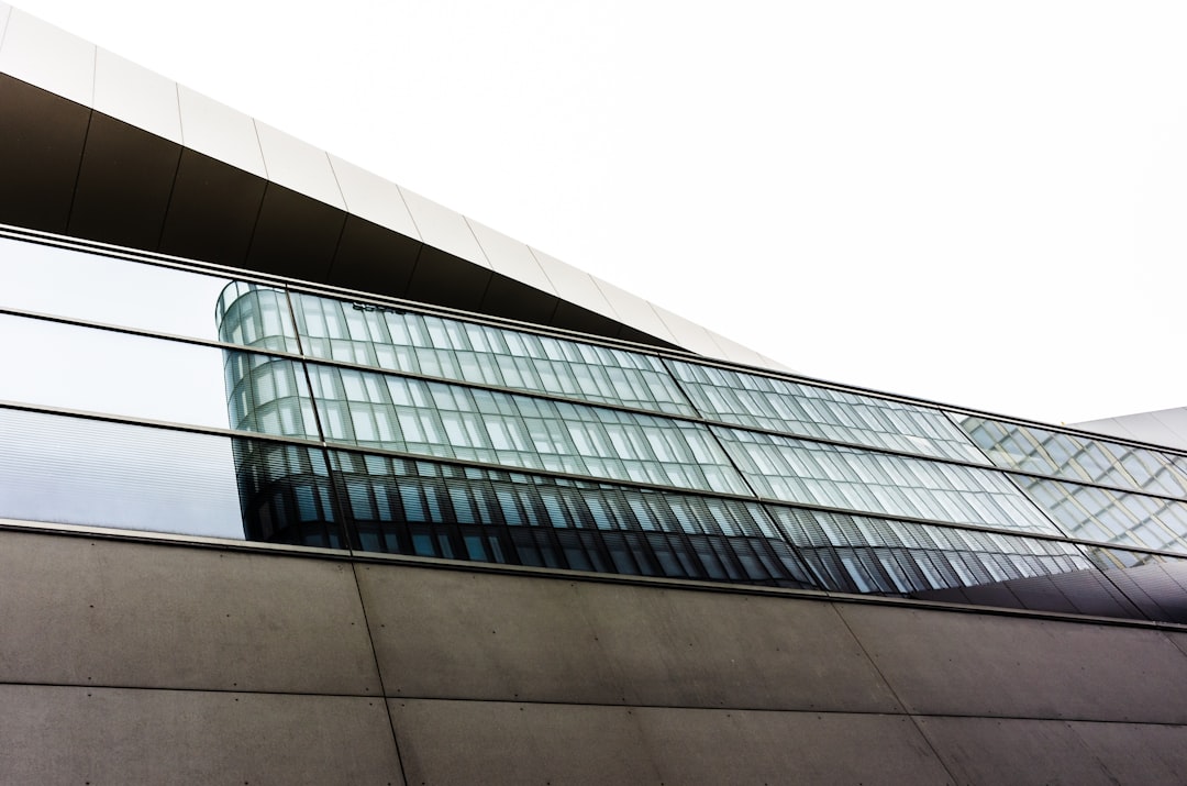 low angle photography of building under white sky