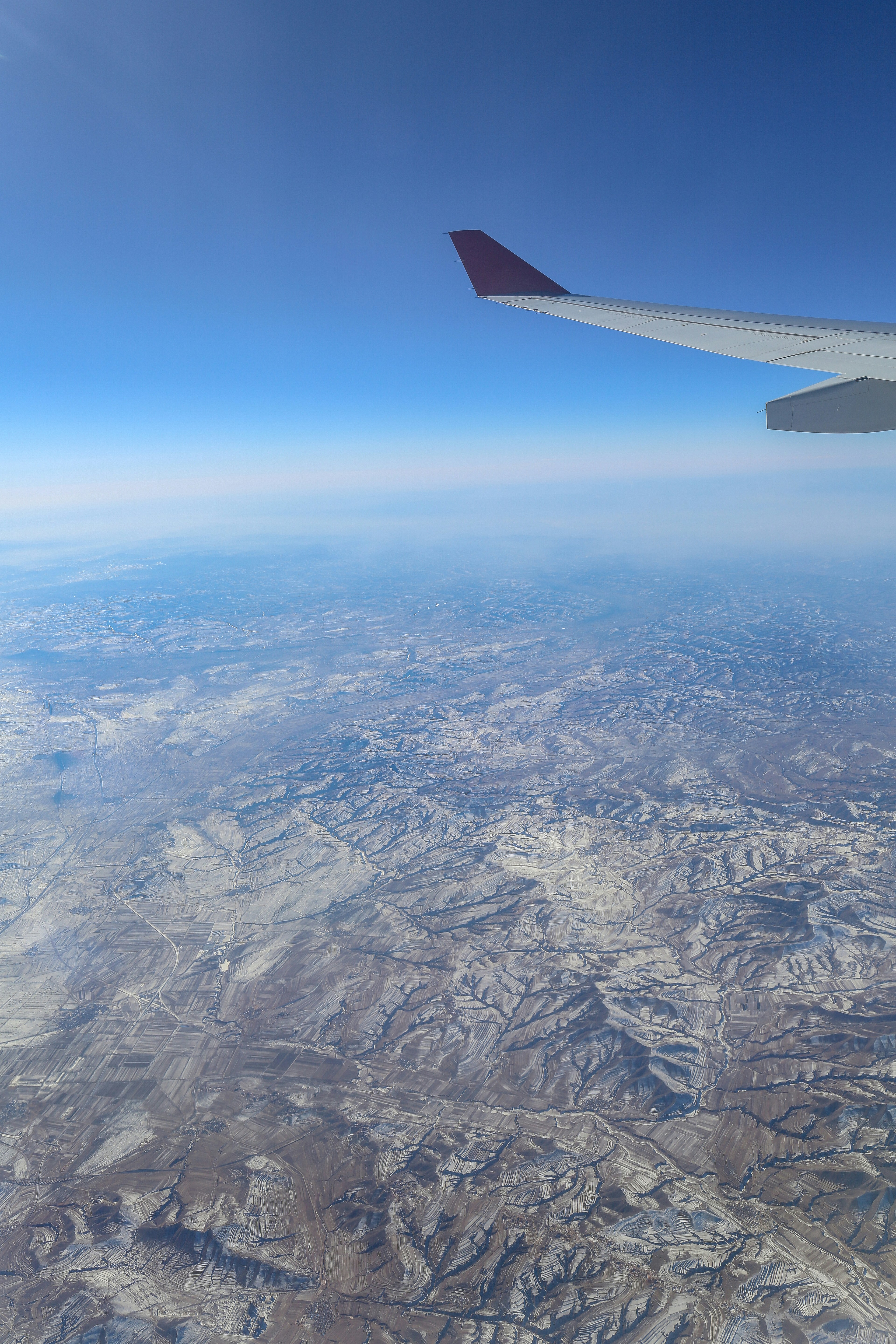 airplane over mountains