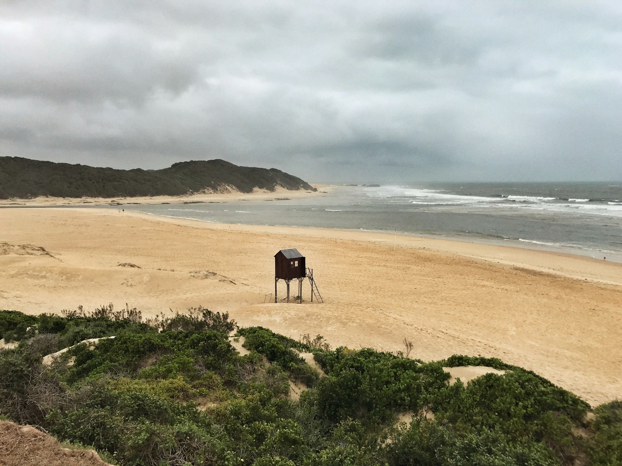 stormy day on the beach, lifeguard house