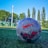 A close-up of a soccer ball on a grassy field, symbolizing the sport and its top scorers.