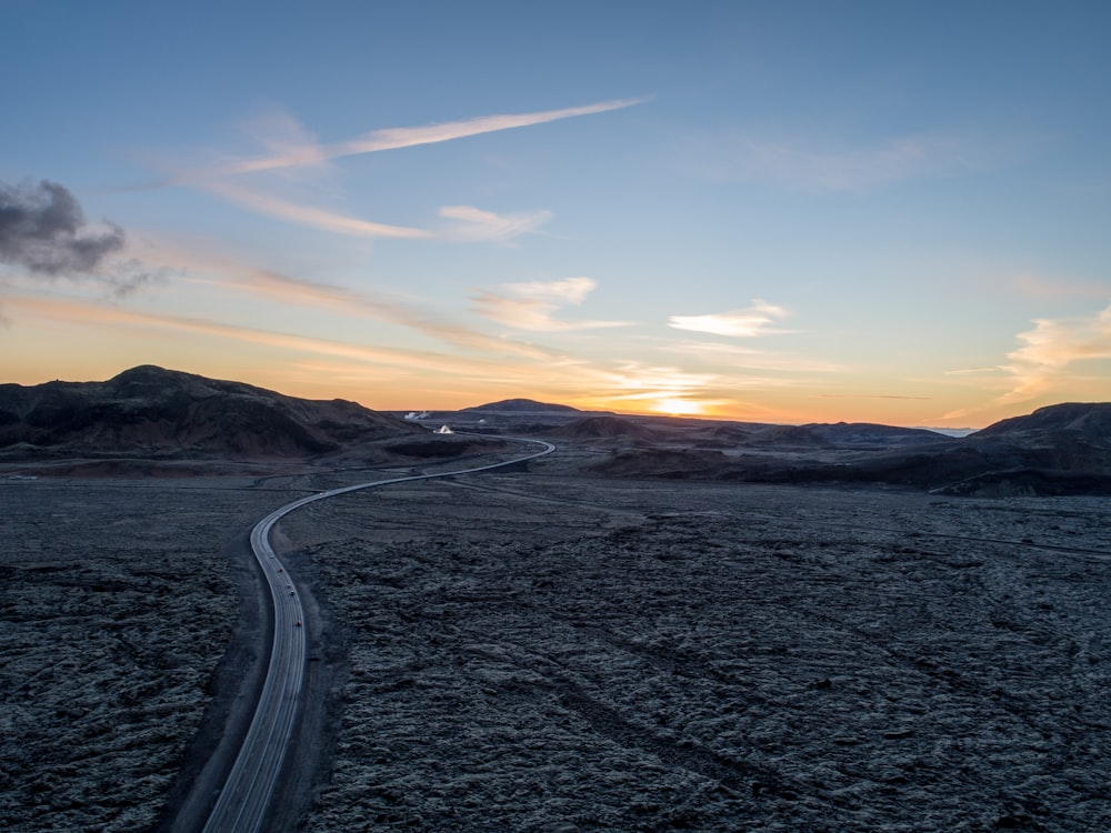 panoramic view of asphalt road during sunset