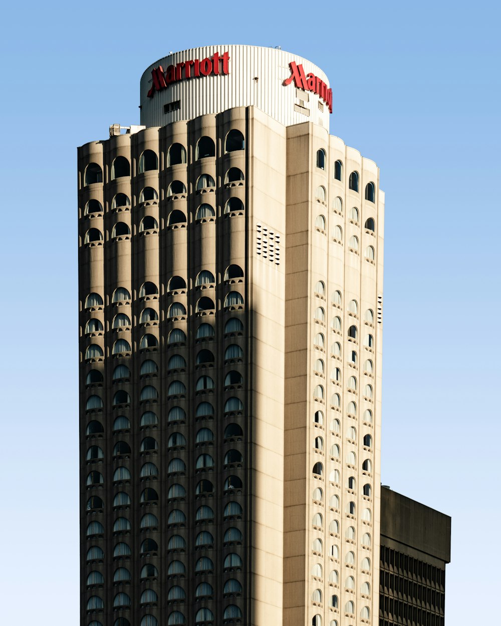 brown and white high-rise building