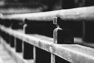 High-resolution image of a custom bamboo railing with soft grey tones, highlighting fine craftsmanship and smooth finishes.