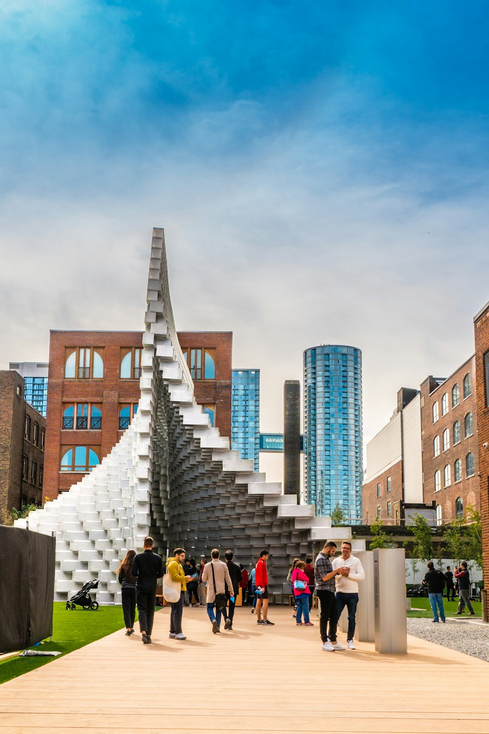 people stands beside tower during daytime