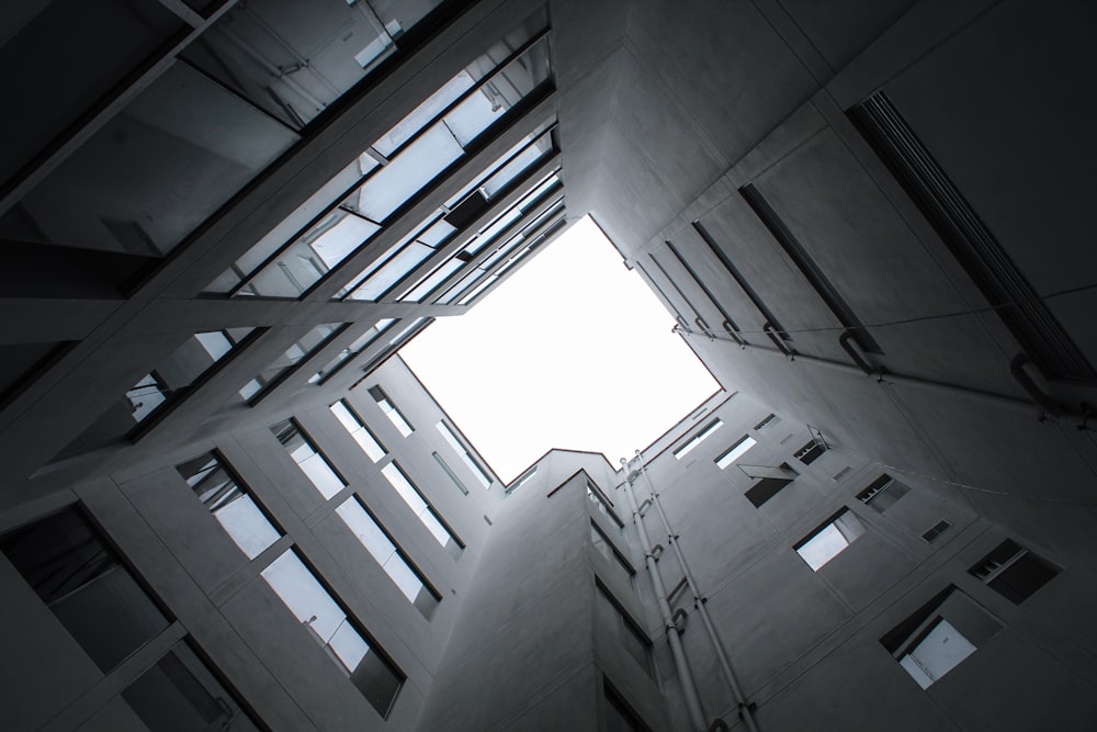 worm-eye view of gray high-rise building